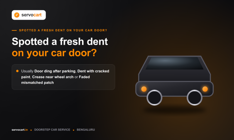 Technician inspecting a car door dent to decide between paintless and traditional dent repair
